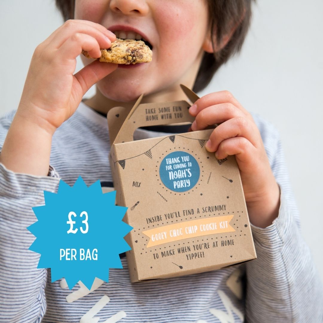 Child enjoying a cookie from Craft & Crumb's Gooey Choc Chip Cookie Kit, priced at £3 per bag, ideal for kids' parties in the UK.