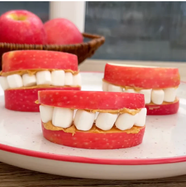 Apple grins