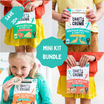 Child holding Craft & Crumb baking kits, including pizza, dinosaur, and cool cat biscuits, with a "Save 20%" tag.