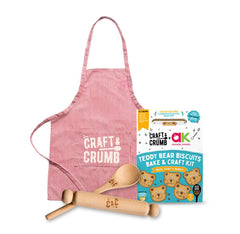 Teddy bear biscuit kit with apron and rolling pins, featuring Craft & Crumb branding.