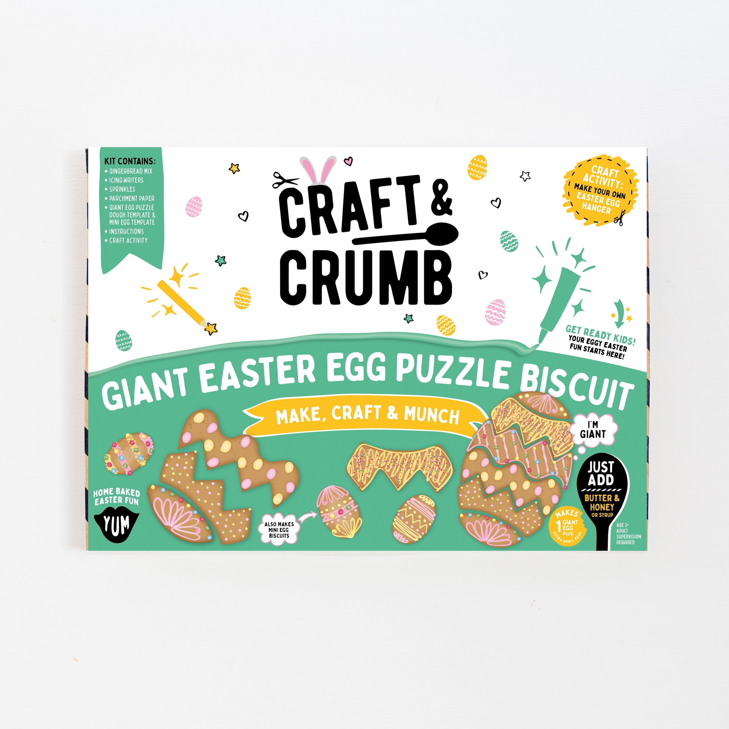 Giant Easter egg puzzle biscuit kit with colorful packaging, featuring decorated egg-shaped cookies and crafting tools.